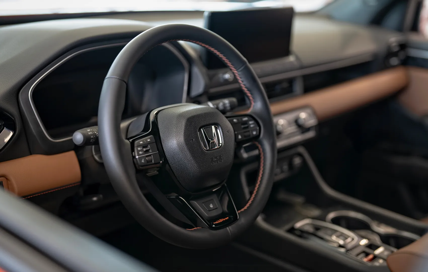 Honda steering wheel and dashboard